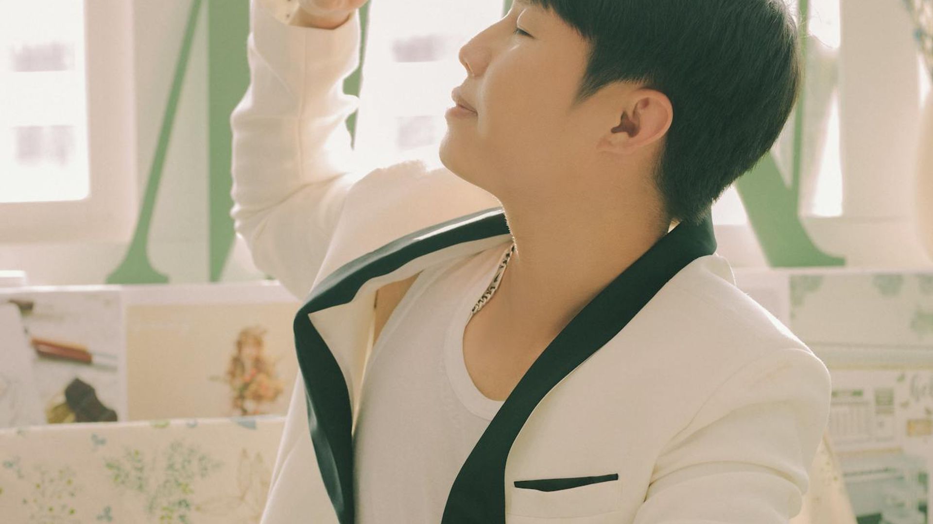 Soft morning light illuminating a modern workspace with green plants